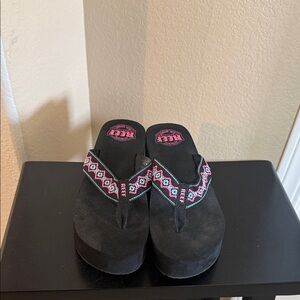 Reef Black Sandals with Vibrant Strap